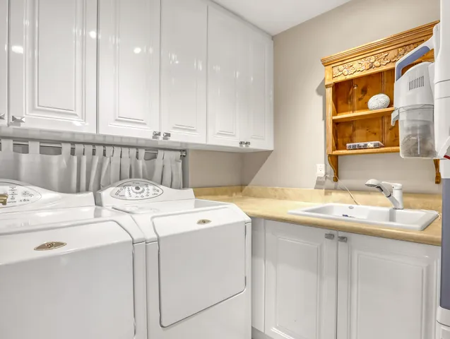 a view of a city from a corridor