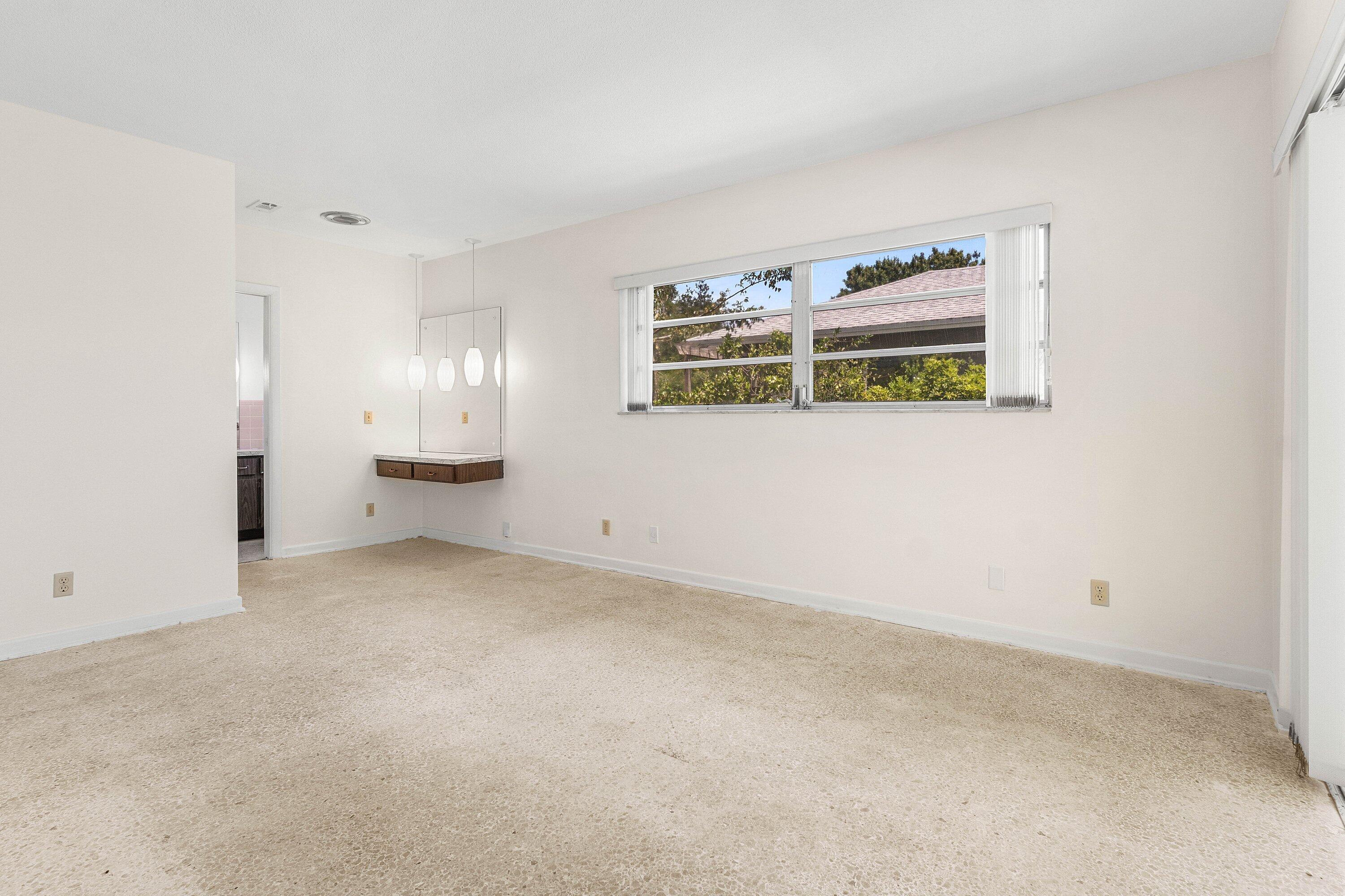 1000 Northwest 7th Street Boca Raton, FL 33486 - Photo 11 of 28 Primary Bedroom