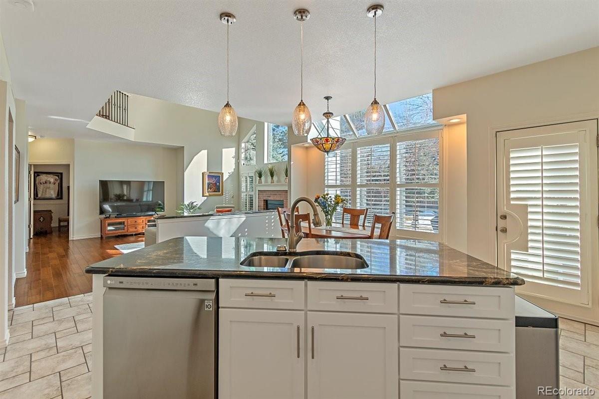 2290 Crestmont Lane Highlands Ranch, CO 80126 - Photo 12 of 40 a kitchen with sink and window