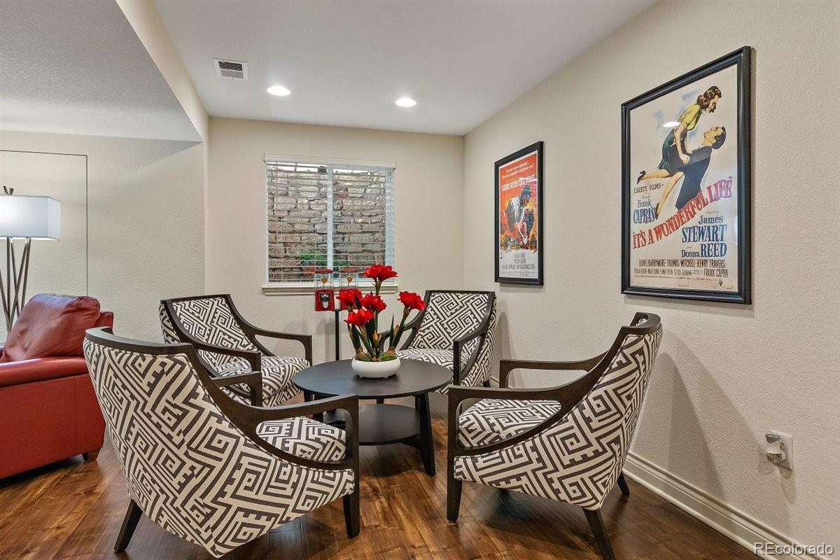 2290 Crestmont Lane Highlands Ranch, CO 80126 - Photo 31 of 40 a view of a dining room with furniture