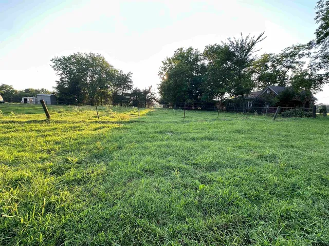 a view of a golf course with a lake