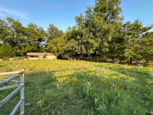a view of yard with lake view