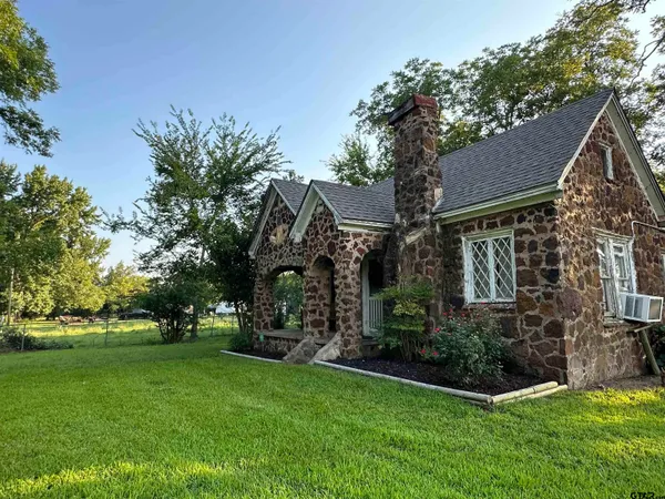 a view of a house with a park
