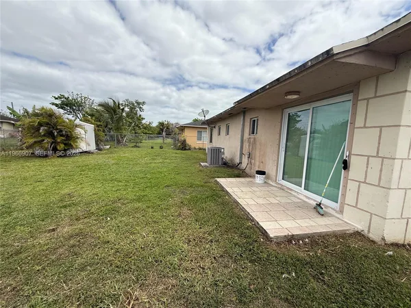 a house view with garden space