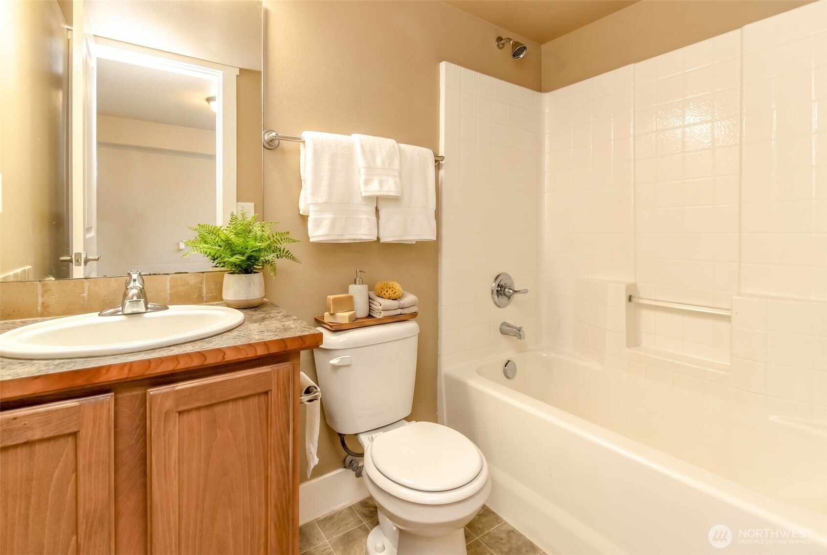3000 South Mt Baker Boulevard Seattle, WA 98144 - Photo 37 of 40 a bathroom with a granite countertop sink toilet and shower