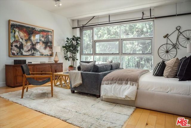 a bathroom with a sink toilet and mirror