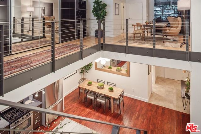 a view of swimming pool with outdoor seating and a couch