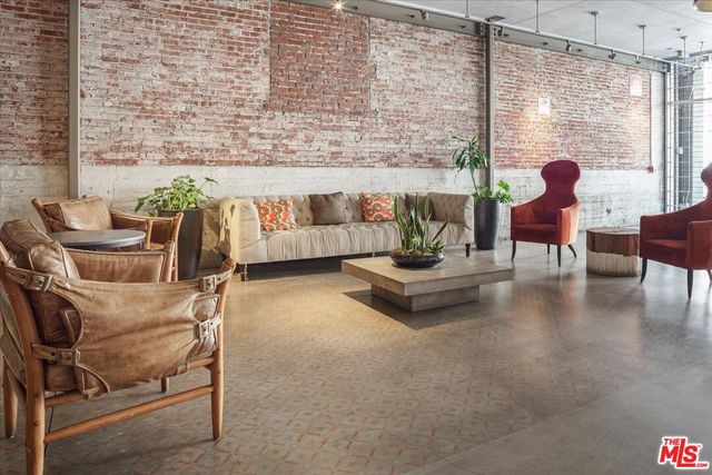 a outdoor space with lots of white furniture