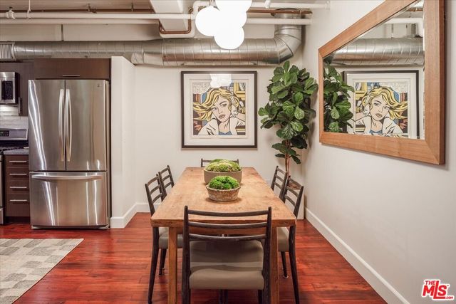 a living room with furniture fireplace and a flat screen tv