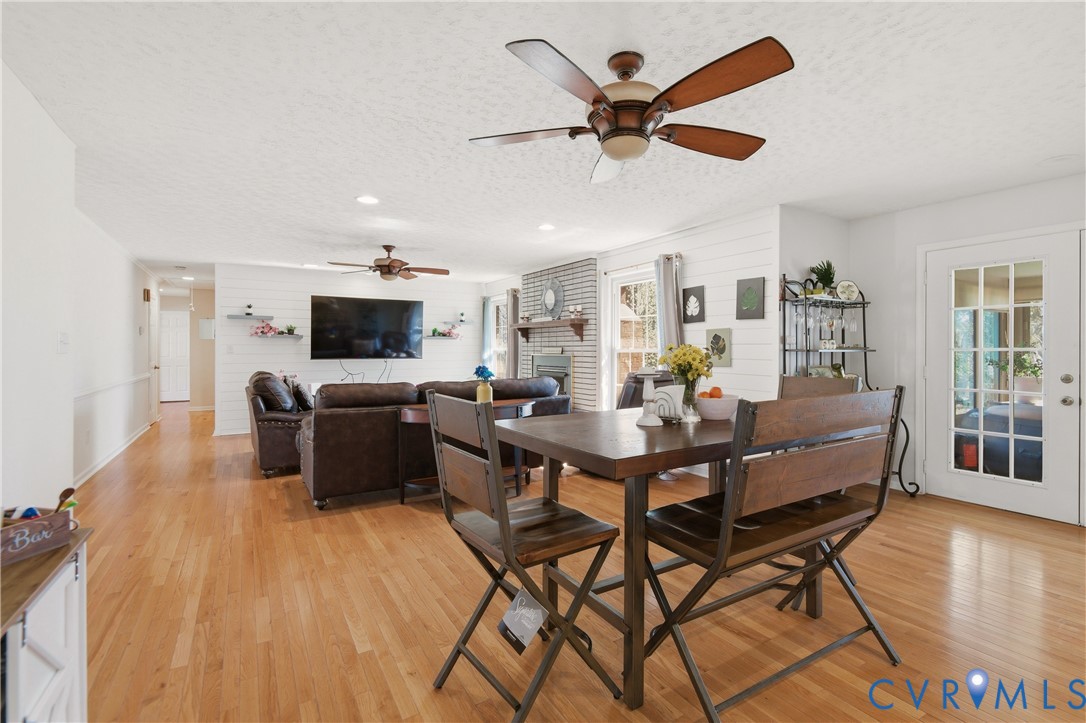 107 Oxford Road Hopewell, VA 23860 - Photo 25 of 50 Hardwood flooring, white shiplap accent wall, buil