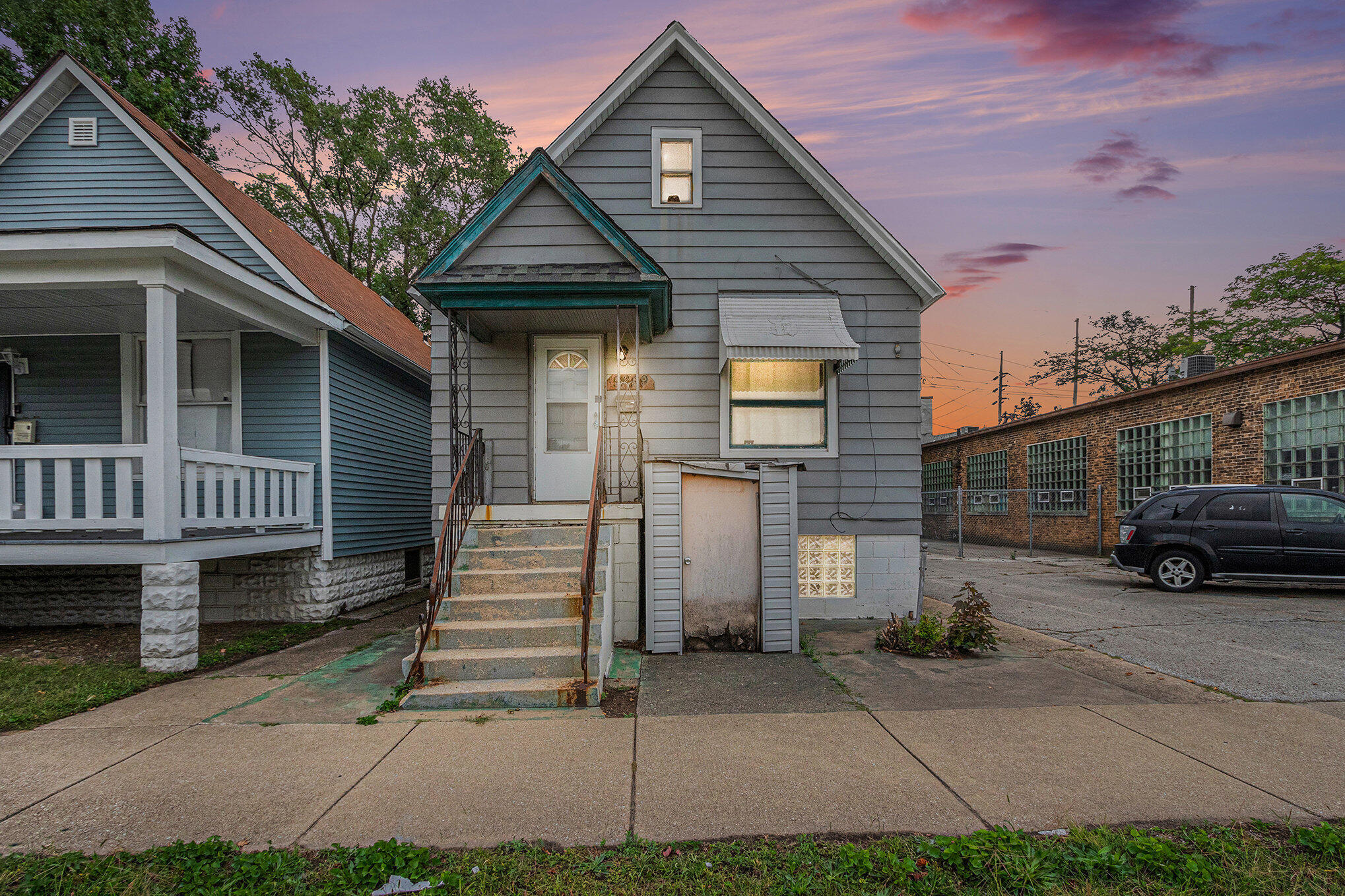5259 State Line Avenue Hammond, IN 46320 - Photo 1 of 17 a front view of a house with a yard and garage