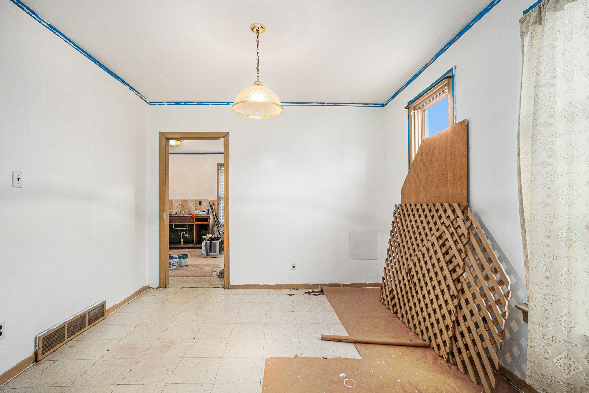 5259 State Line Avenue Hammond, IN 46320 - Photo 4 of 17 a view of a bedroom with wooden floor and a ceiling fan