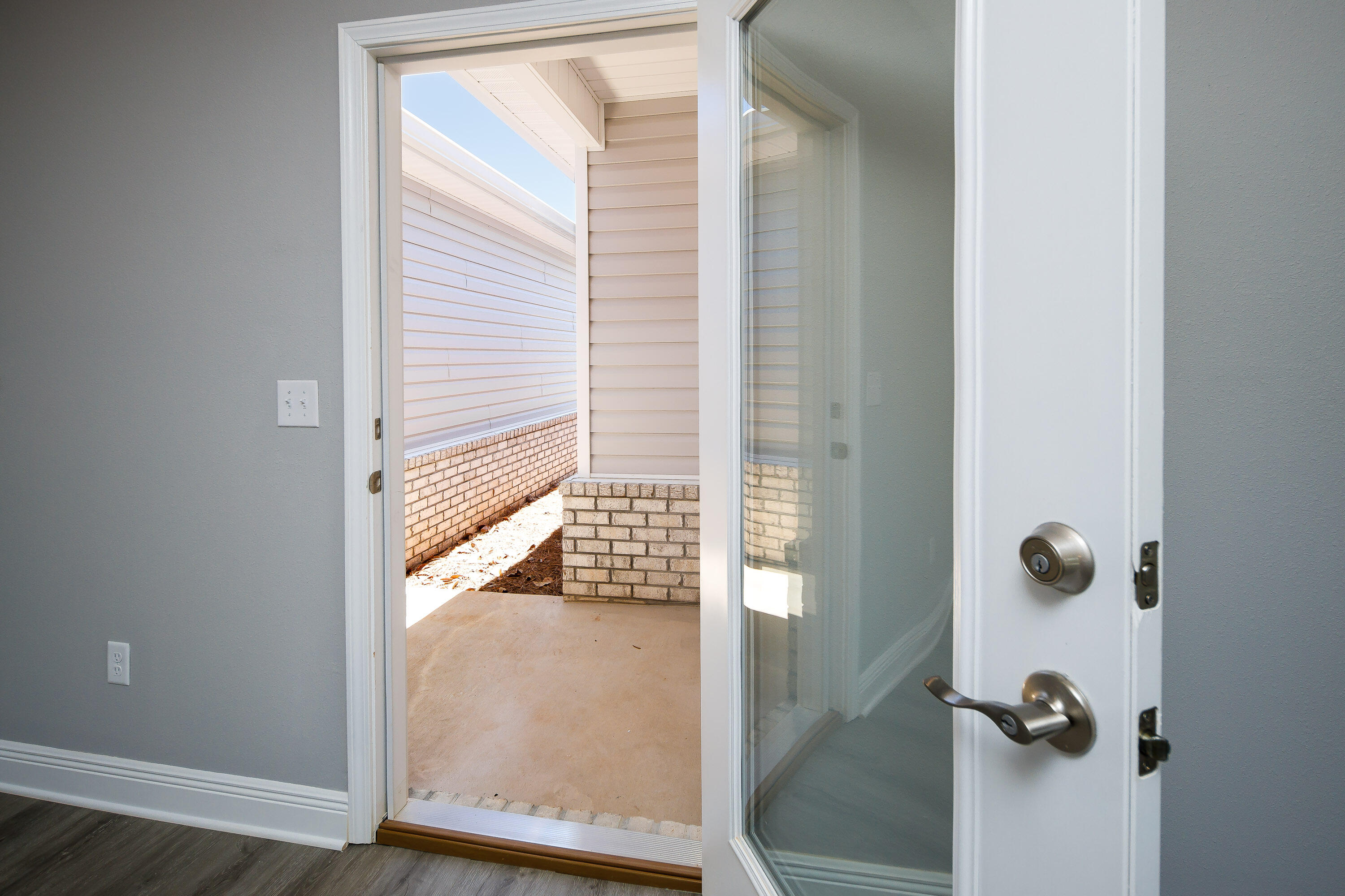 959 Skylark Road Mary Esther, FL 32569 - Photo 18 of 41 a view of a bathroom with a glass door