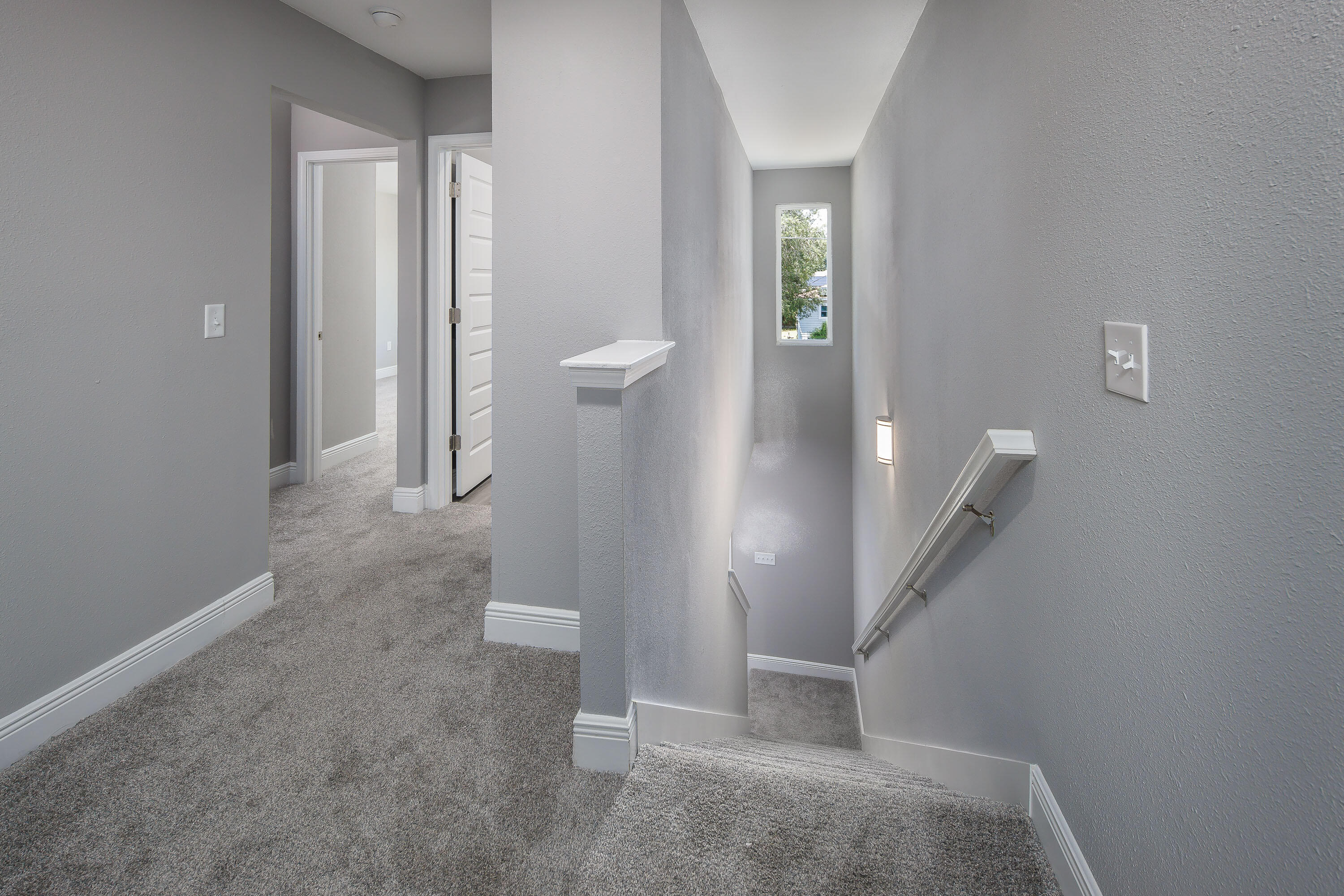 959 Skylark Road Mary Esther, FL 32569 - Photo 28 of 41 a view of a hallway with staircase