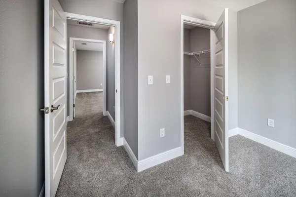 wooden view of closet area