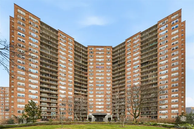 a living room with granite countertop lots of wooden furniture
