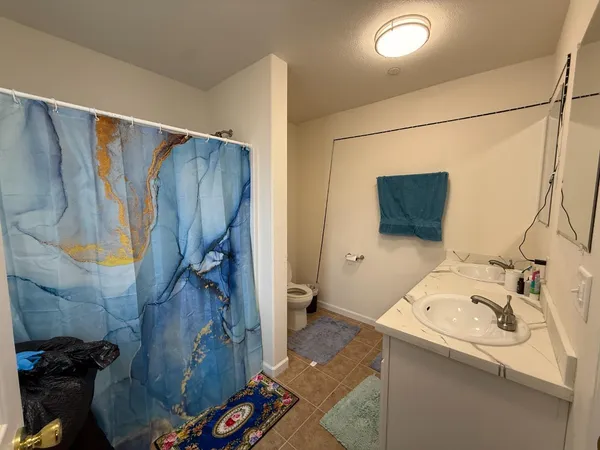 a bathroom with a sink and mirror