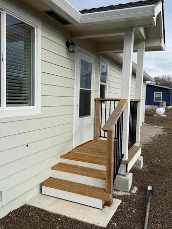 a view of entryway with a front door