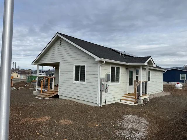 a view of a house with a patio