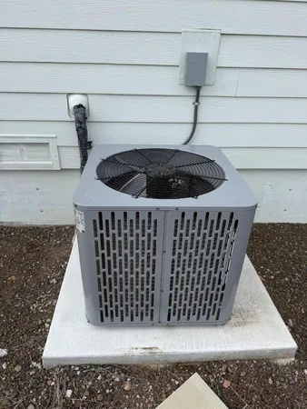 a view of a building with car parked