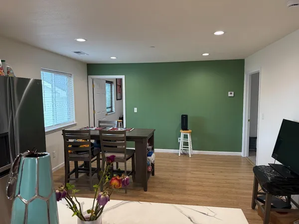 a view of a dining room with furniture