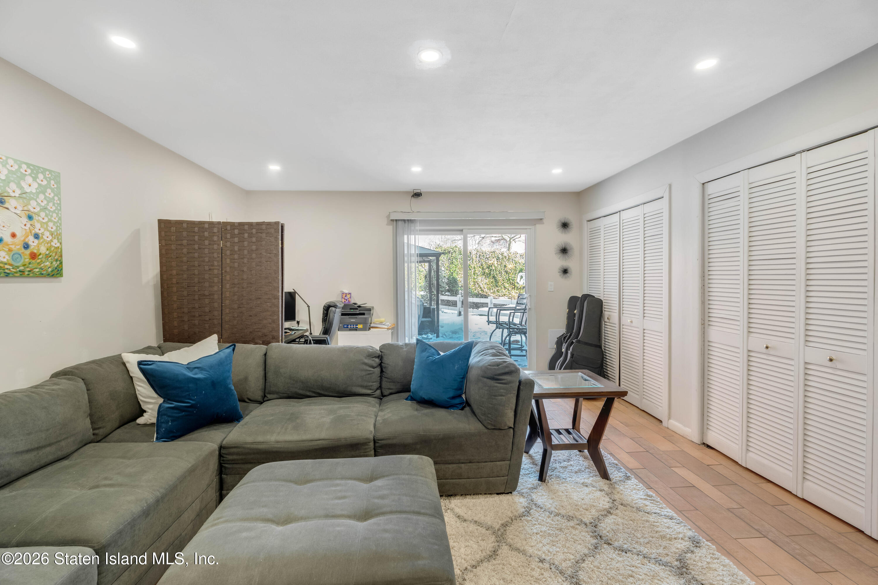 929 West Fingerboard Road Staten Island, NY 10304 - Photo 13 of 14 a living room with furniture and a window