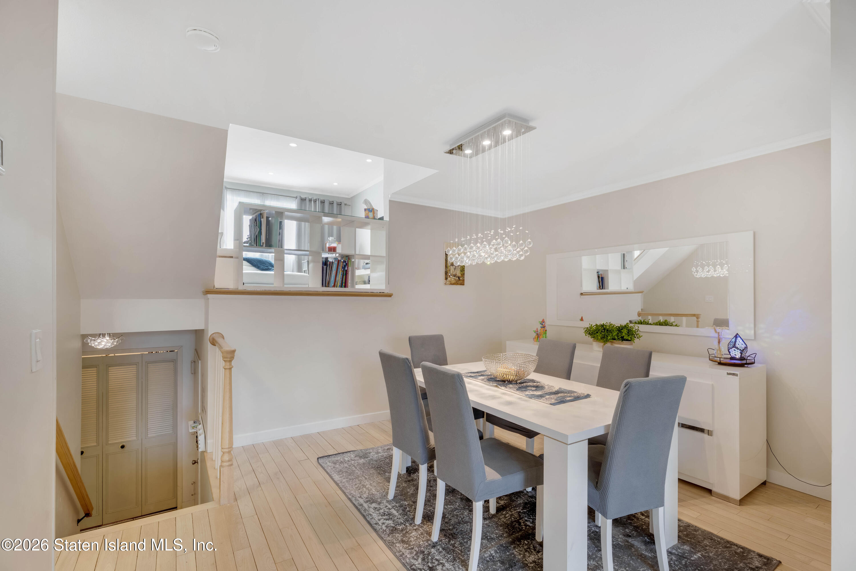 929 West Fingerboard Road Staten Island, NY 10304 - Photo 5 of 14 a view of a dining room with furniture and wooden floor