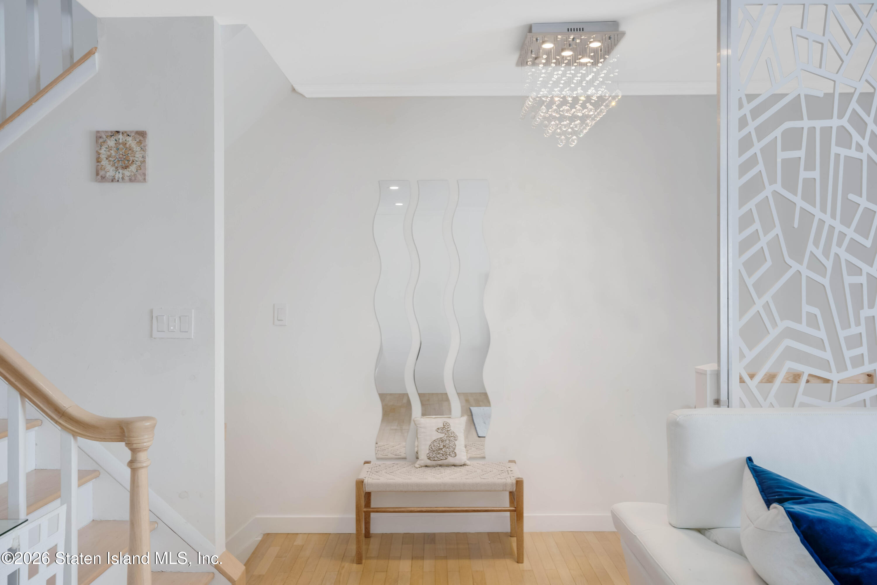 929 West Fingerboard Road Staten Island, NY 10304 - Photo 6 of 14 a bathroom with a sink and a mirror