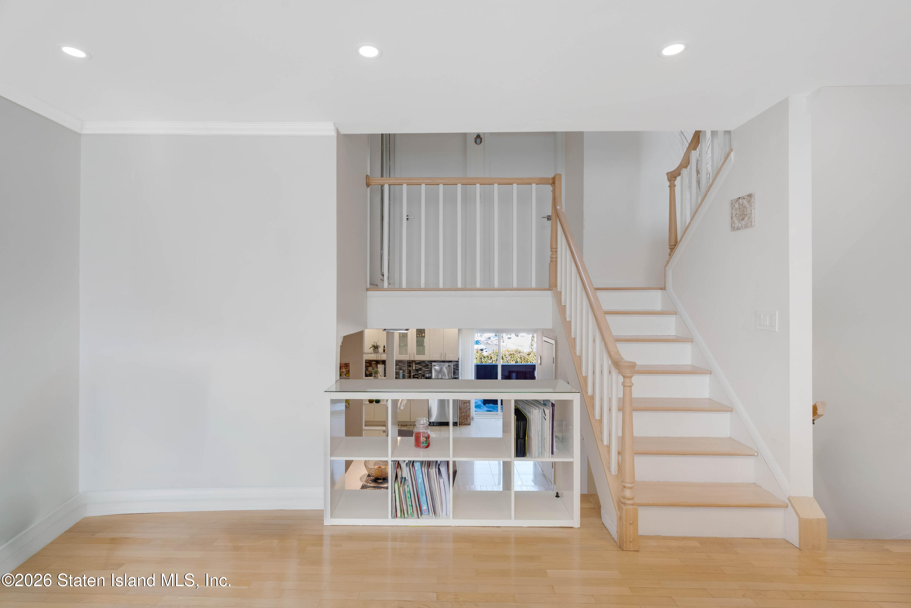 929 West Fingerboard Road Staten Island, NY 10304 - Photo 7 of 14 a view of staircase with white walls and empty room
