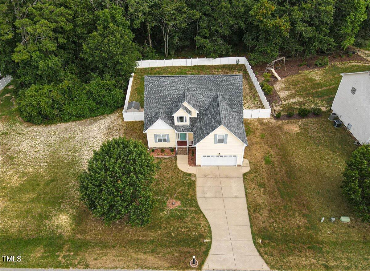 a view of swimming pool with a yard