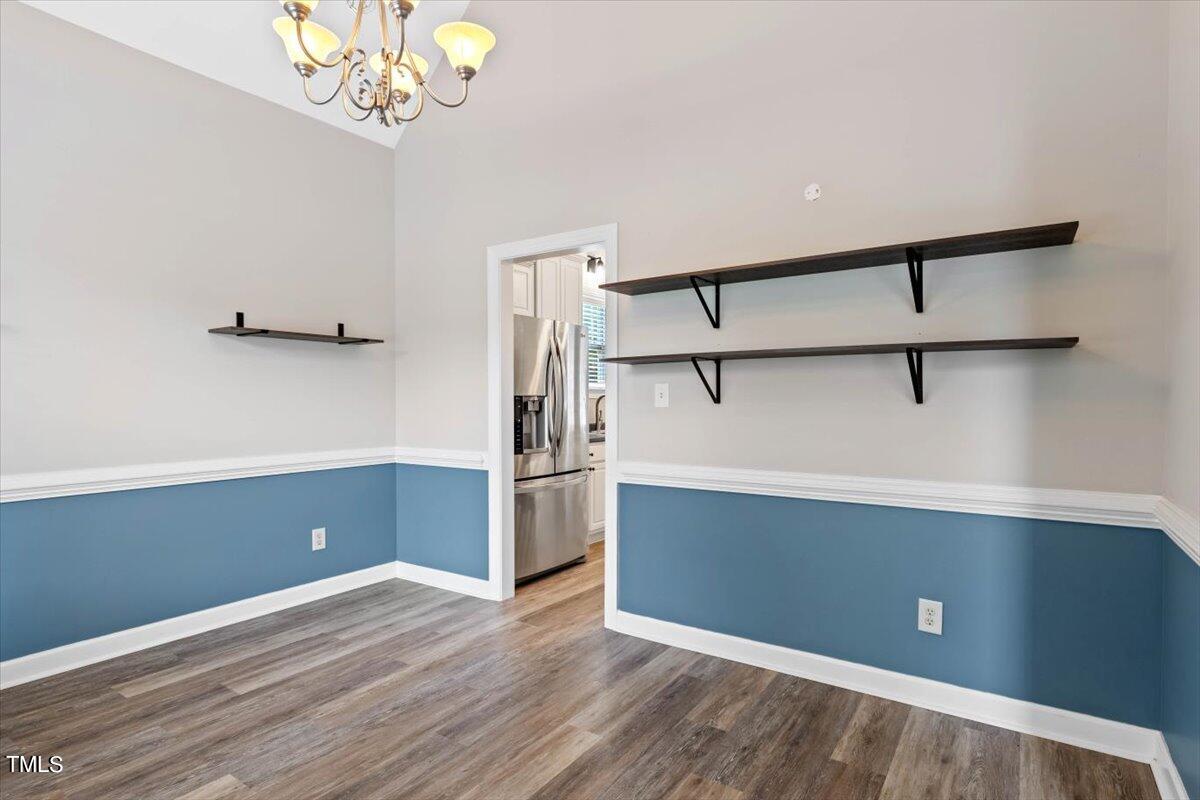 134 Blessed Lane Angier, NC 27501 - Photo 17 of 41 a view of a room with wooden floor and staircase