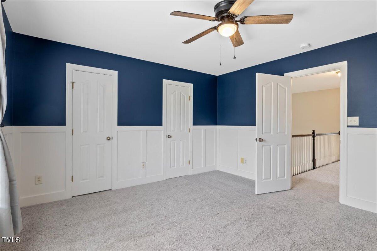 134 Blessed Lane Angier, NC 27501 - Photo 26 of 41 a view of empty room with wooden floor