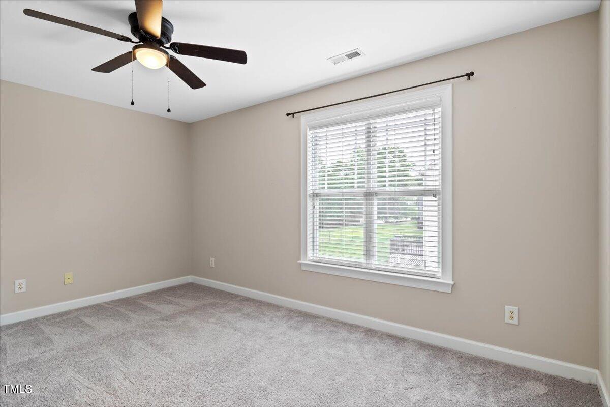 134 Blessed Lane Angier, NC 27501 - Photo 27 of 41 a view of an empty room with a window