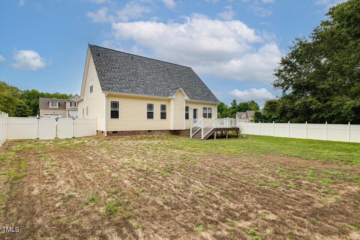 134 Blessed Lane Angier, NC 27501 - Photo 34 of 41 a view of a house with a yard