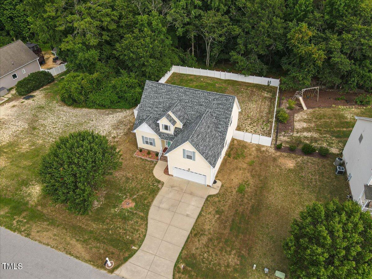 134 Blessed Lane Angier, NC 27501 - Photo 38 of 41 aerial view of a house with swimming pool