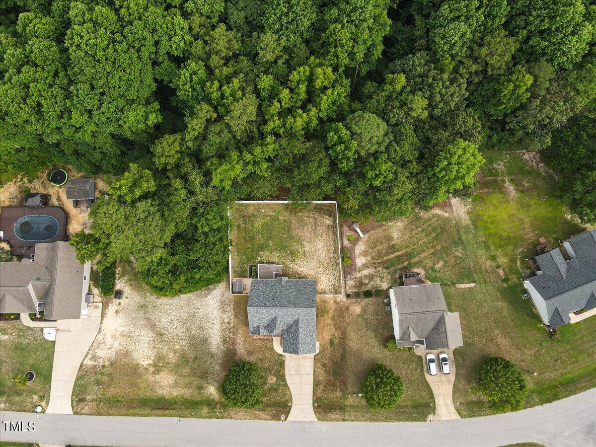 134 Blessed Lane Angier, NC 27501 - Photo 4 of 41 an aerial view of residential houses with outdoor space