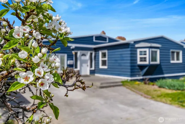a house with a table and chairs in patio
