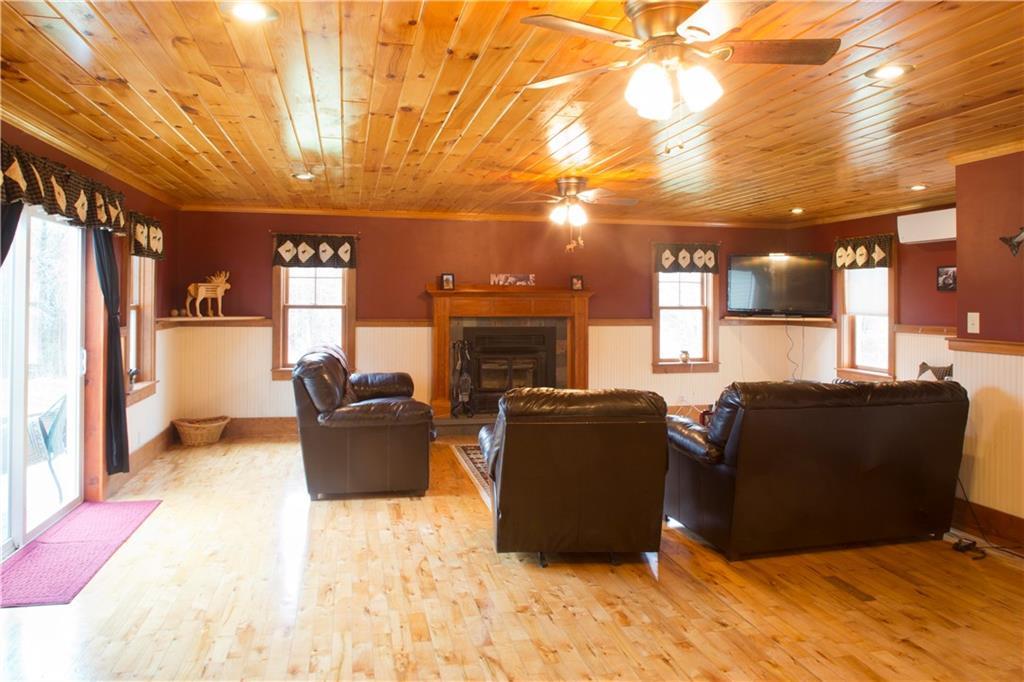 27 Ash Hill Road Carmel, ME 04419 - Photo 7 of 35 Great room has slider to backyard deck