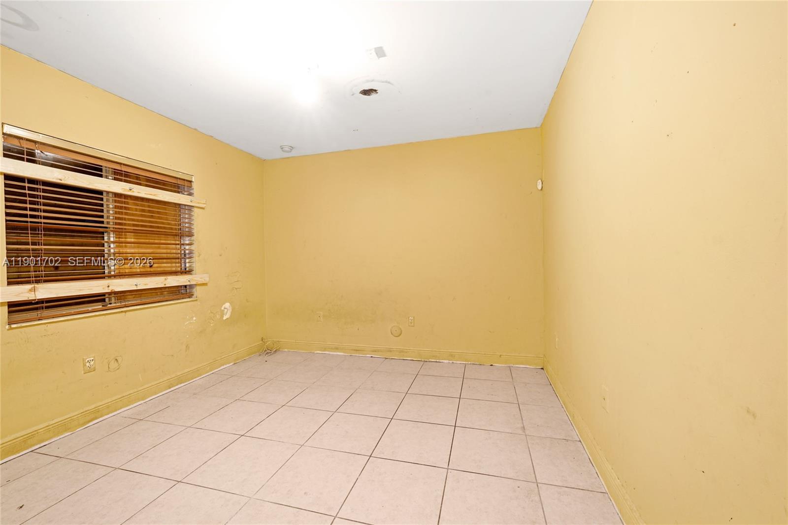 2951 Northwest 57th Street Miami, FL 33142 - Photo 16 of 24 a view of an empty room