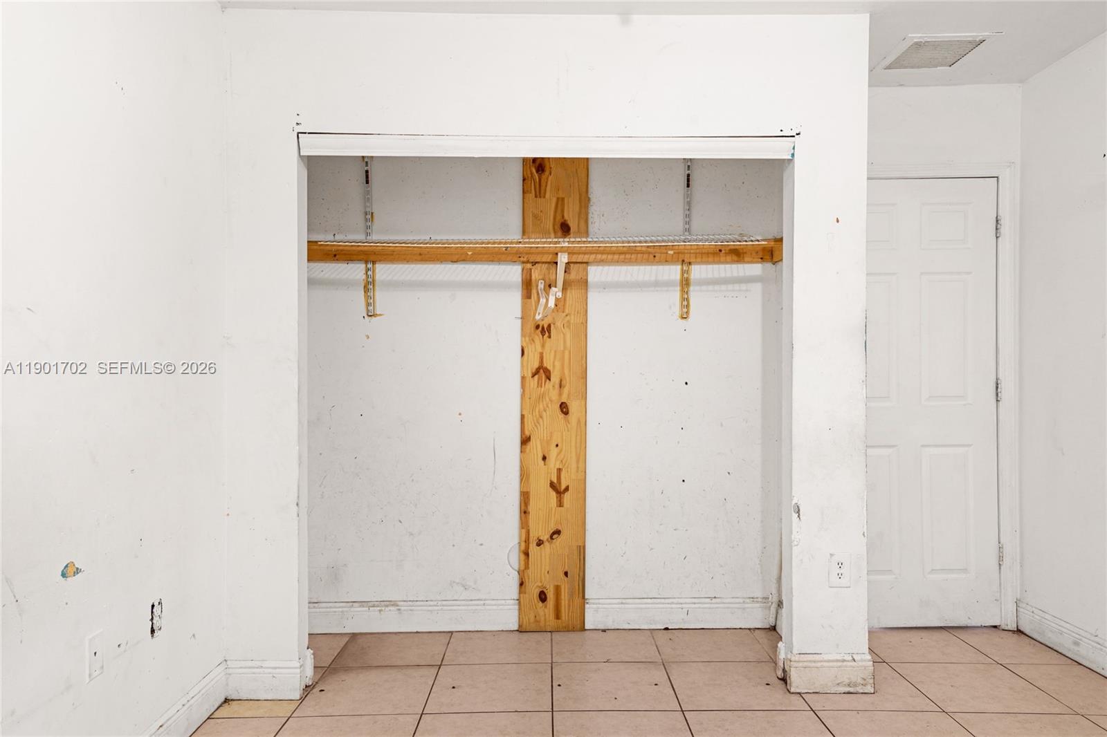 2951 Northwest 57th Street Miami, FL 33142 - Photo 19 of 24 a view of walk in closet