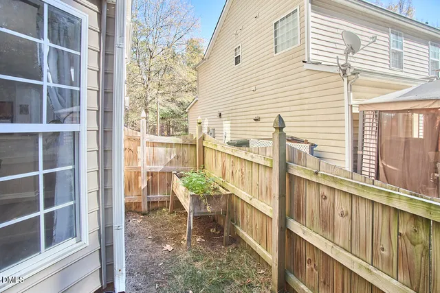 a view of a backyard with furniture