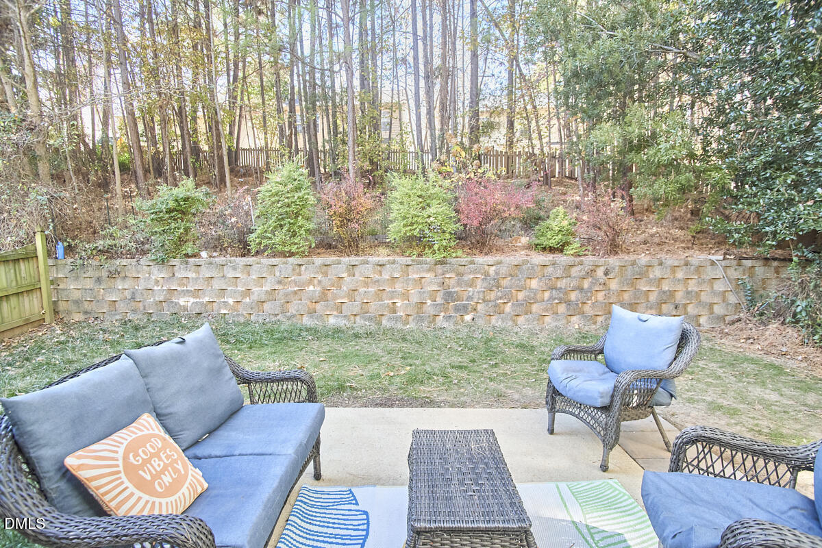 8441 Lunar Stone Place Raleigh, NC 27613 - Photo 12 of 43 a view of a backyard with furniture