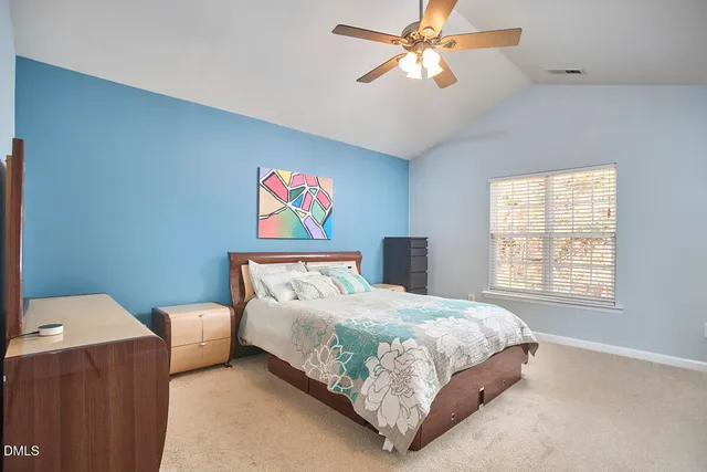 a bathroom with a double vanity sink mirror and bathtub