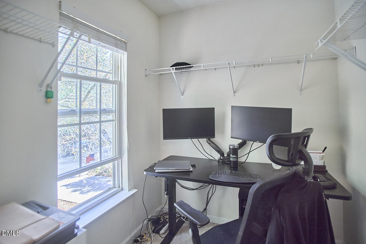 8441 Lunar Stone Place Raleigh, NC 27613 - Photo 33 of 43 a view of a workspace with a window