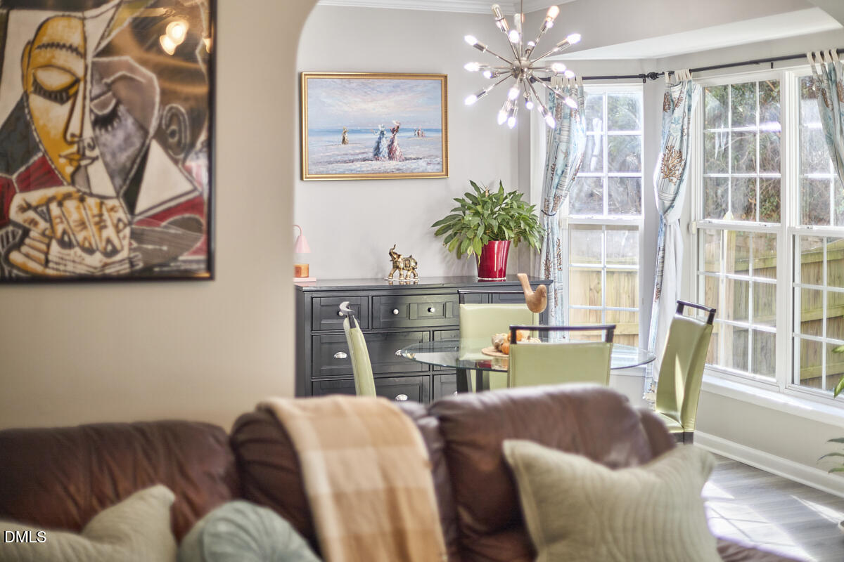 8441 Lunar Stone Place Raleigh, NC 27613 - Photo 40 of 43 a living room with furniture and a fireplace