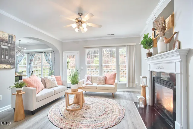 a bedroom with furniture and a chandelier