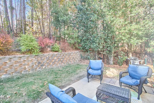 a view of a balcony with chair and the porch