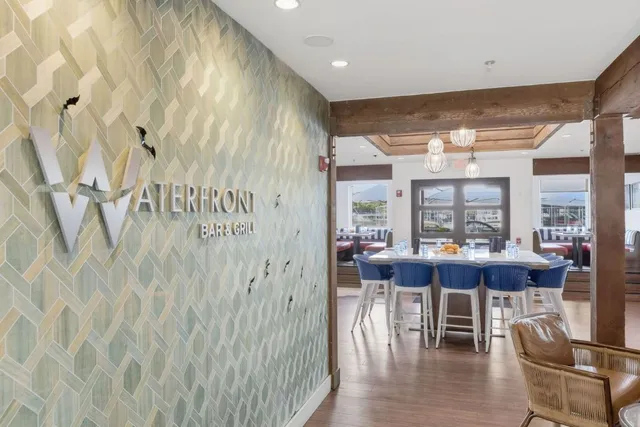 a terrace with outdoor seating and city view