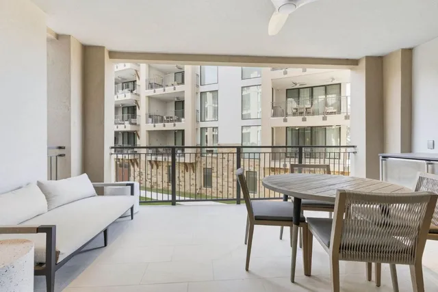 a bathroom with a sink toilet and a mirror