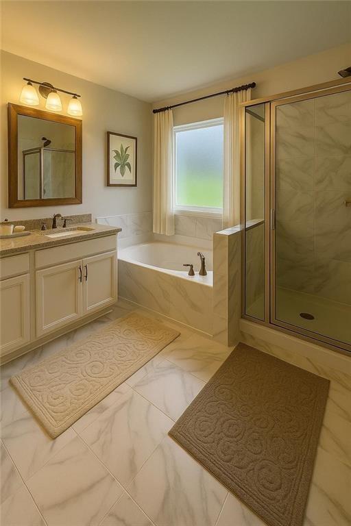 65 Shelby Court Commerce, GA 30529 - Photo 11 of 13 a spacious bathroom with a granite countertop sink a mirror and a bathtub